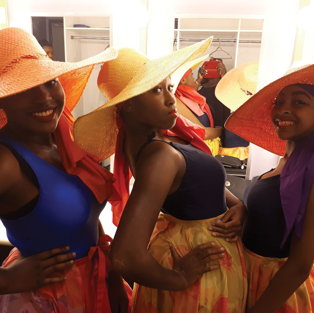 Roots & Branches Image - 3 Dancers In Colored Outfits