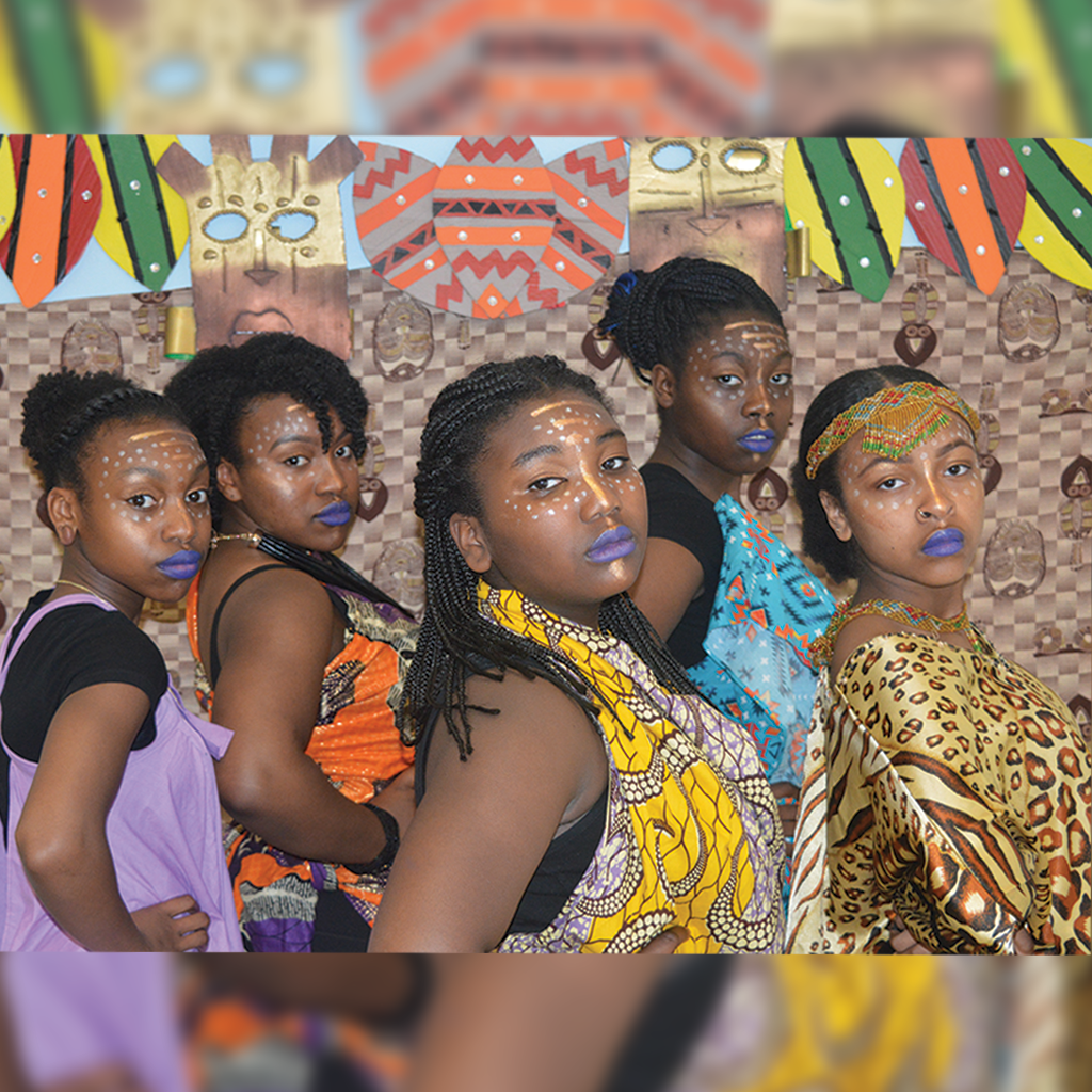 Roots & Branches Image - Group Of dancers pose for the camera